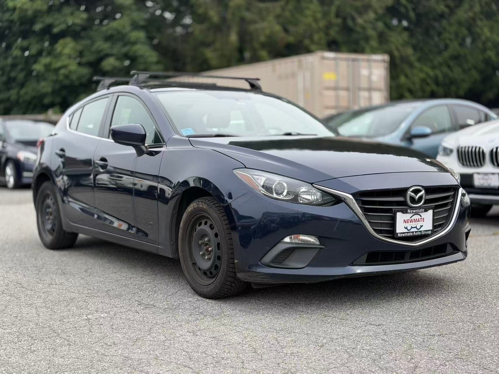 2015 Mazda Mazda3 Sport Touring. LOCAL BC VEHICLE. FULL SERVICE RECORD. SECOND SET OF RIMS & TIRES.