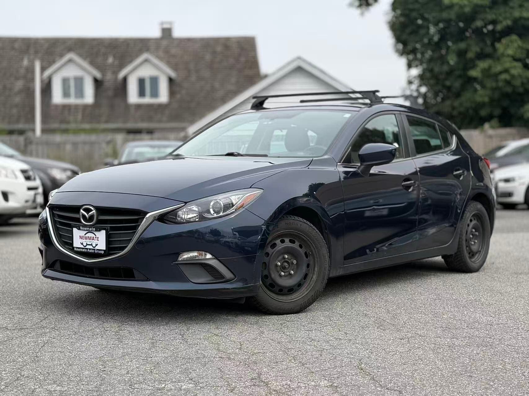 2015 Mazda Mazda3 Sport Touring. LOCAL BC VEHICLE. FULL SERVICE RECORD. SECOND SET OF RIMS & TIRES.